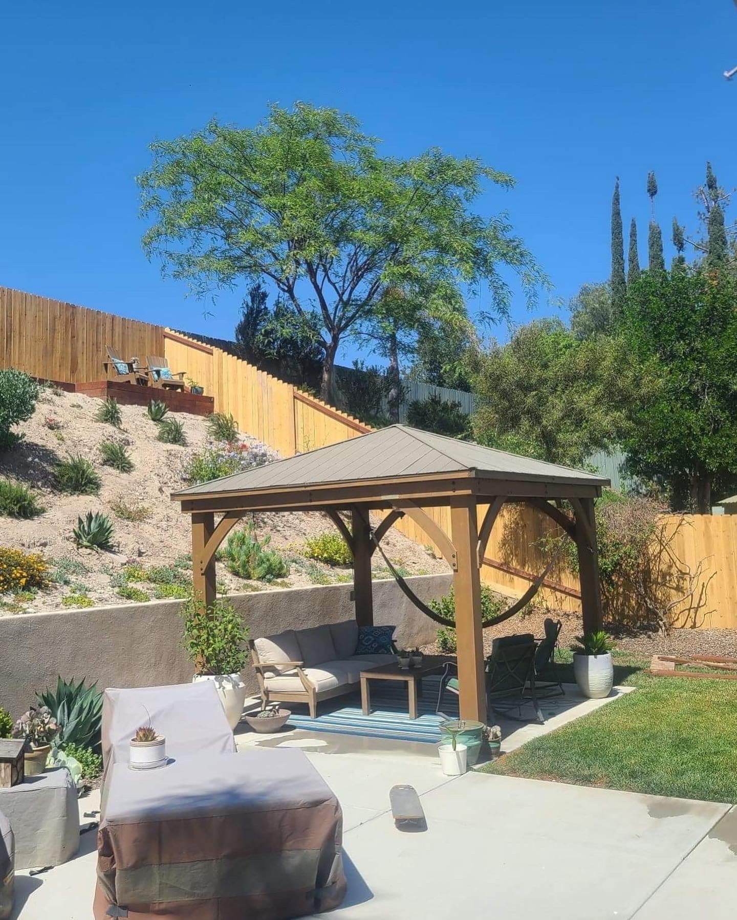 Backyard Gazebo with Wood Fence